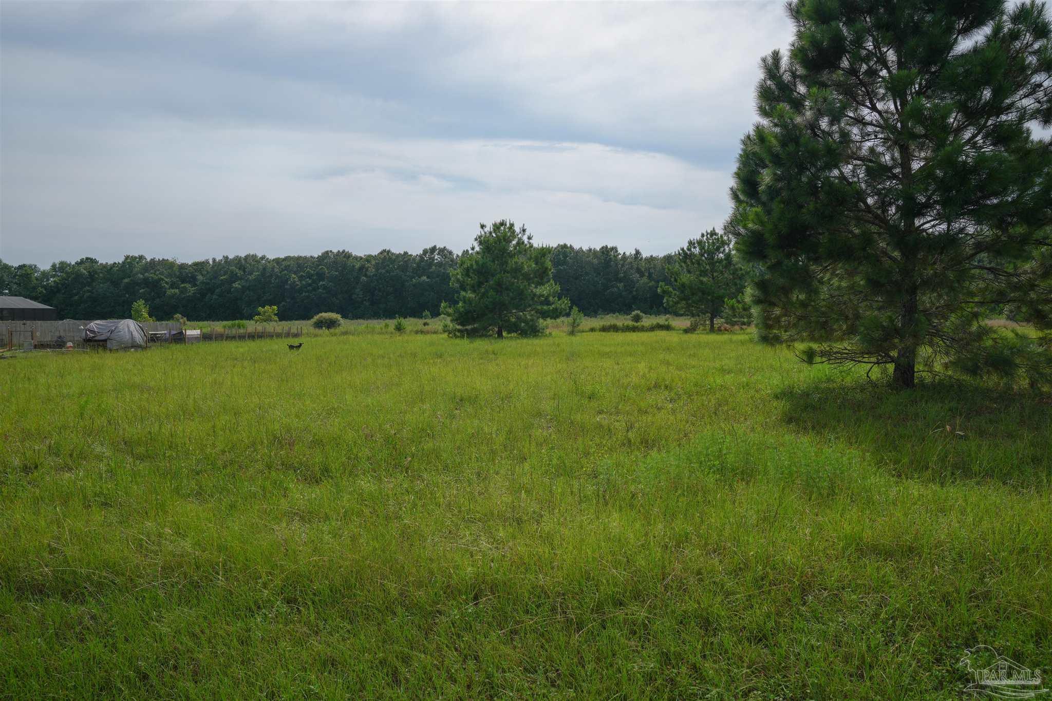Property Photo: 5200 W Spencer Field Rd FL 32571