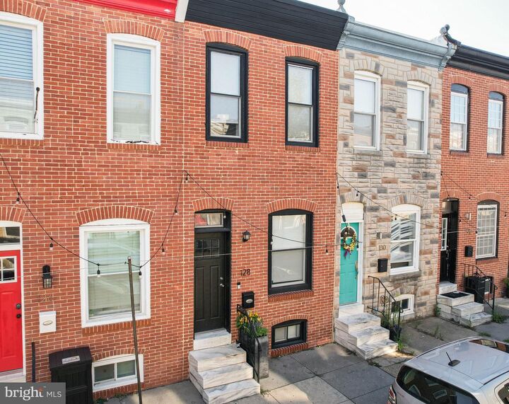 Property Photo:  128 N Curley Street  MD 21224 