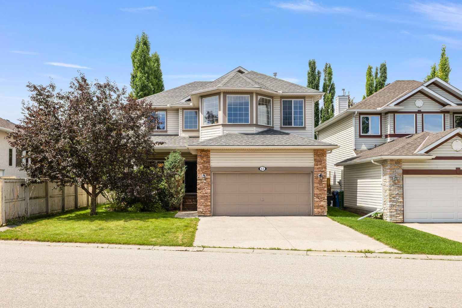 Property Photo:  11 Simcoe Crescent SW  AB T3H 4K6 