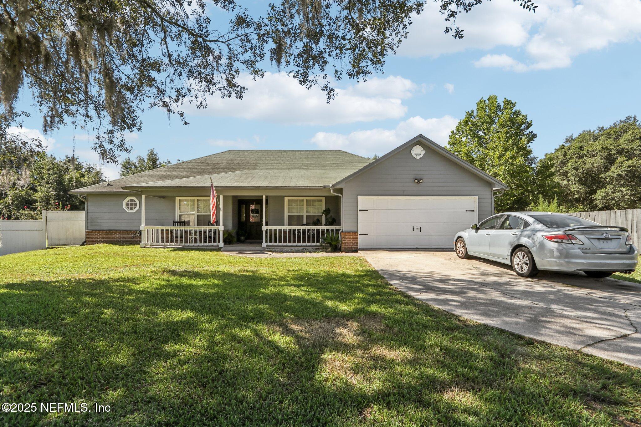 Property Photo: 4459 Eli Whitney Drive FL 32068