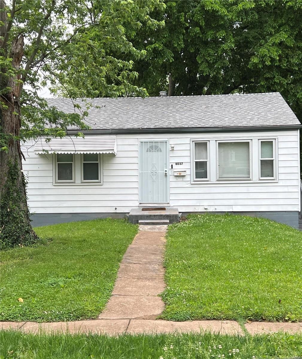 Property Photo: 6037 Evergreen Boulevard MO 63134