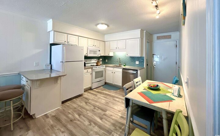 Property Photo:  9530 Shore Dr. 1-J  SC 29572 