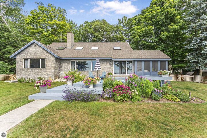 Property Photo:  13890 N Forest Beach Shores  MI 49670 