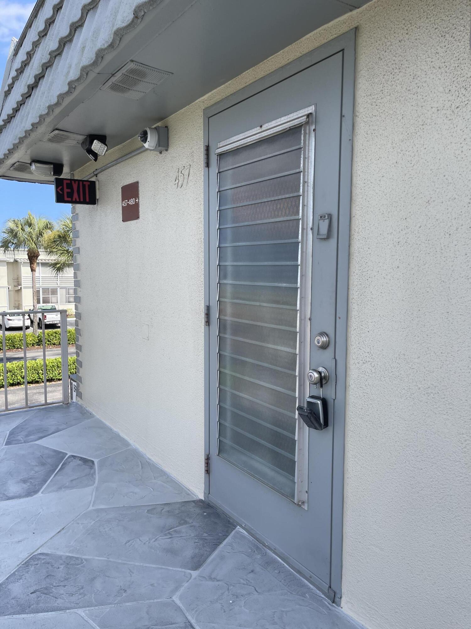 Property Photo:  457 Brittany J  FL 33446 