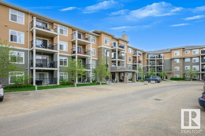Property Photo:  #138 6076 Schonsee Wy NW  AB T5Z 0K8 