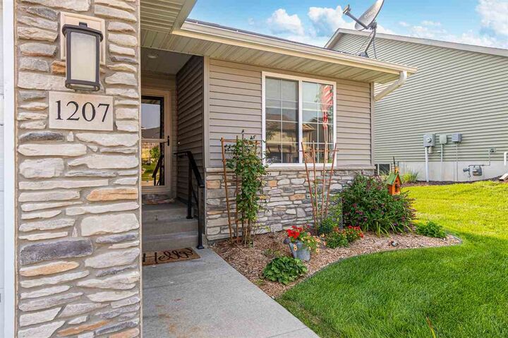 Property Photo: 1207 Creekside Drive IA 52340