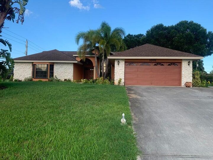 Property Photo: 1001 SW Curtis Street FL 34983