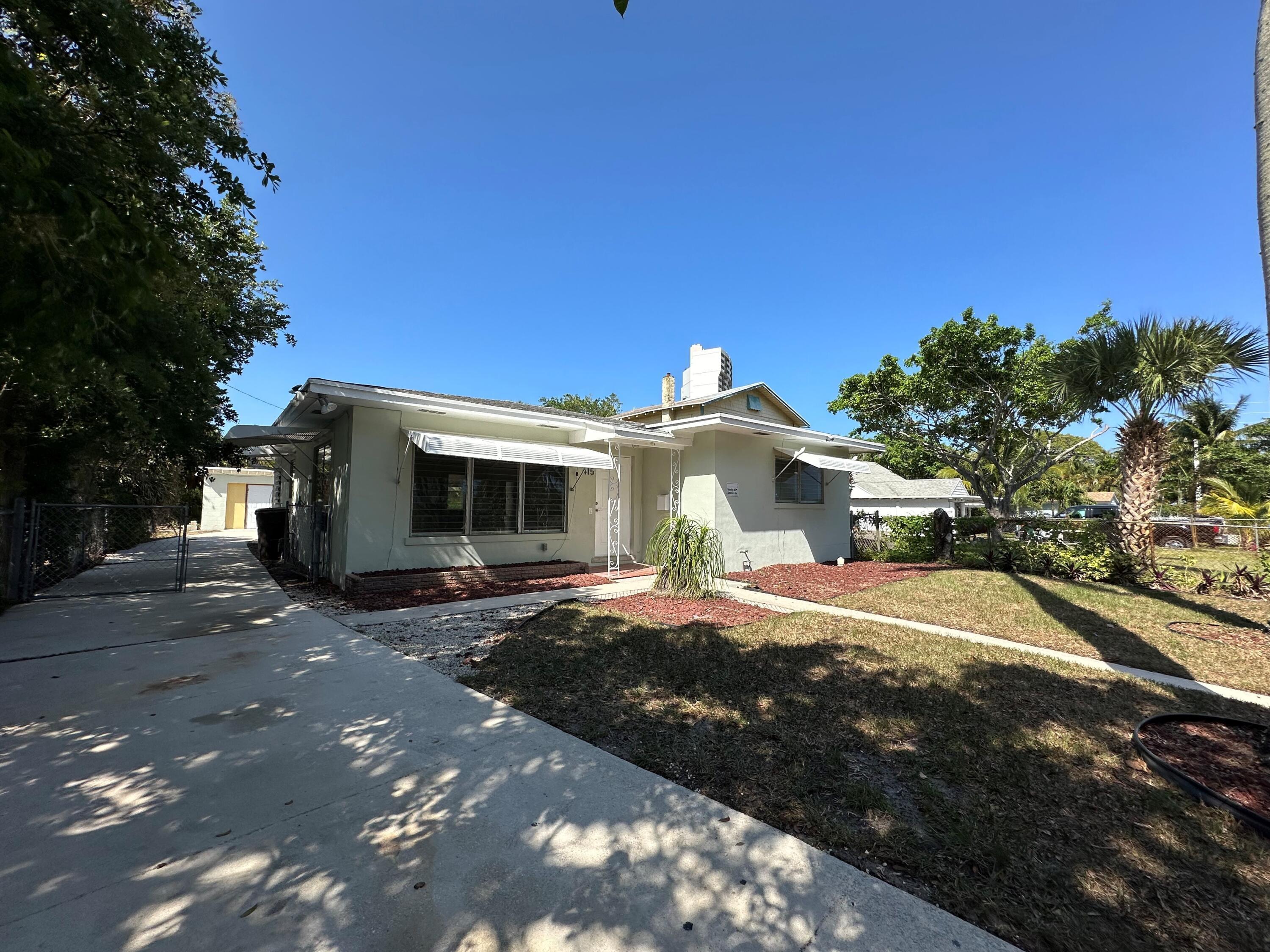 Property Photo:  415 49th Street  FL 33407 