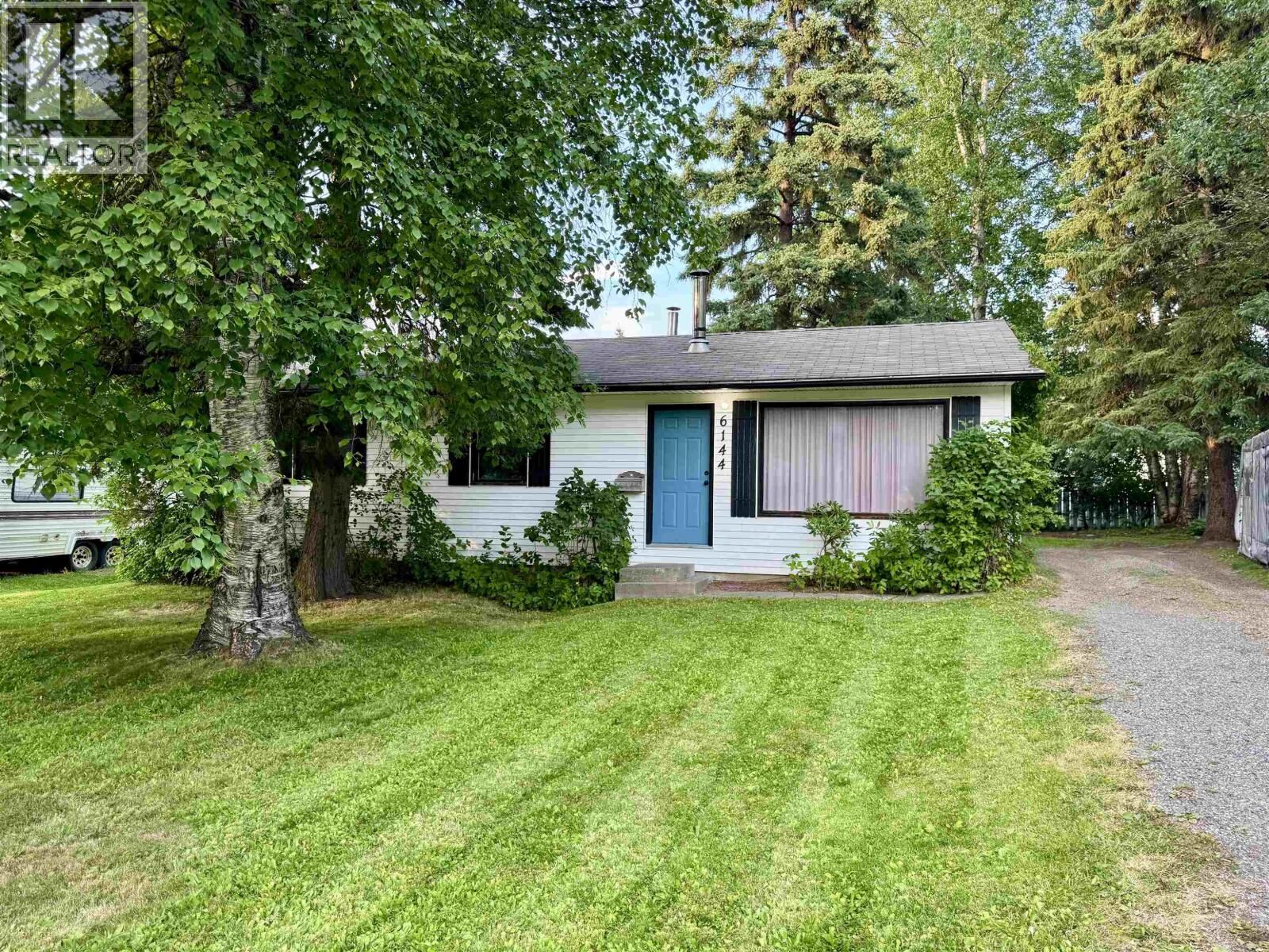 Property Photo:  6144 Birchwood Place  BC V2K 1W6 