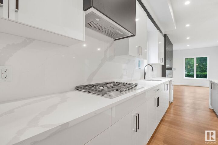 Property Photo:  11036 128 Street NW  AB T5M 0W6 