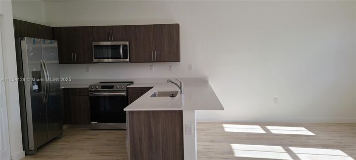 Property Photo: 15540 SW 136 St 204 FL 33196