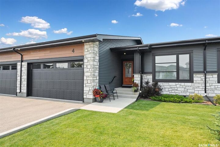Property Photo: 310 Evergreen Boulevard 4 SK S7W 0Z1