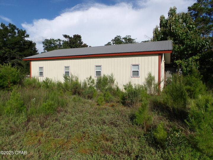 Property Photo:  5491 Highway 77  FL 32428 