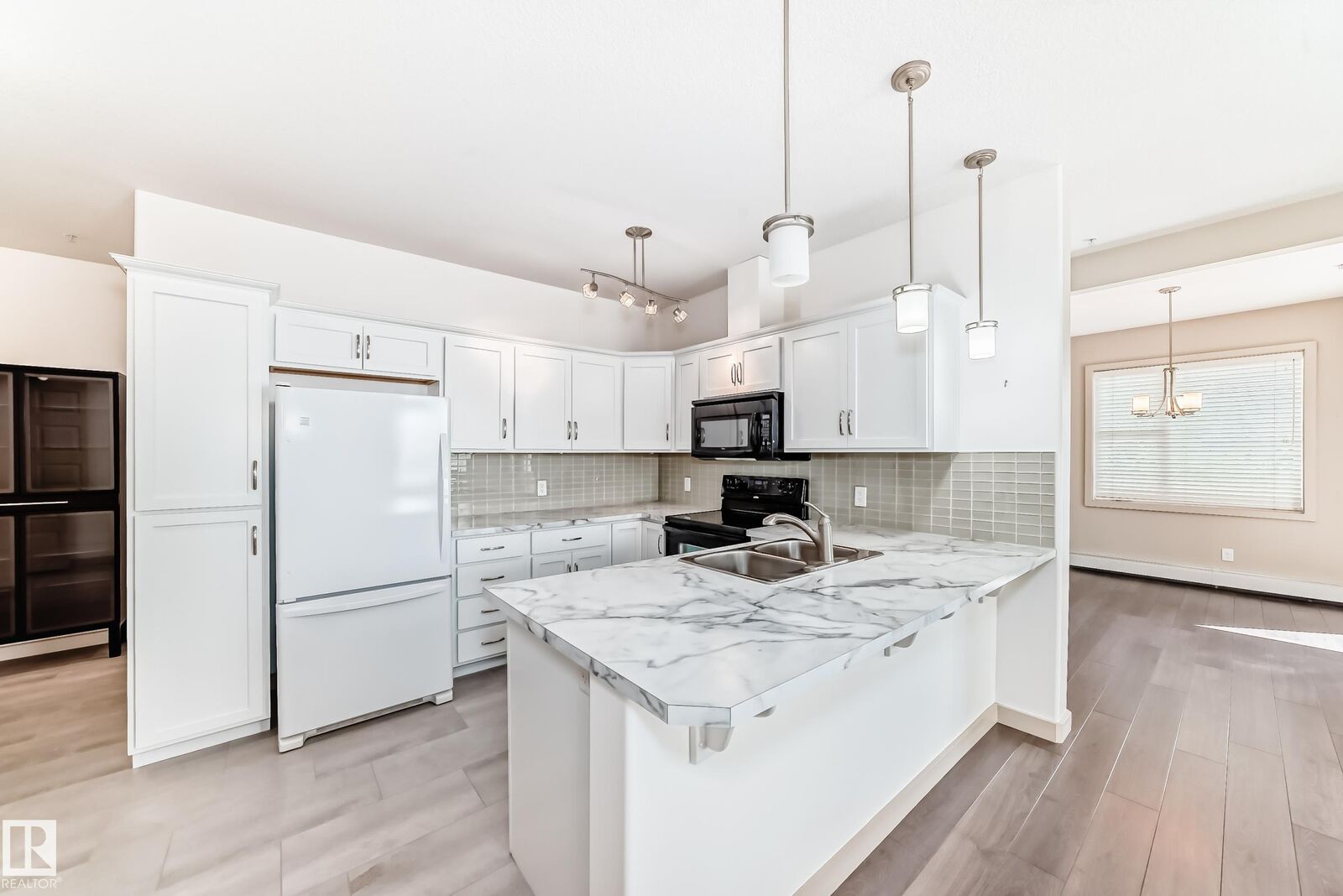 Property Photo:  304 Ambleside Link Link SW 202  AB T6W 0V2 
