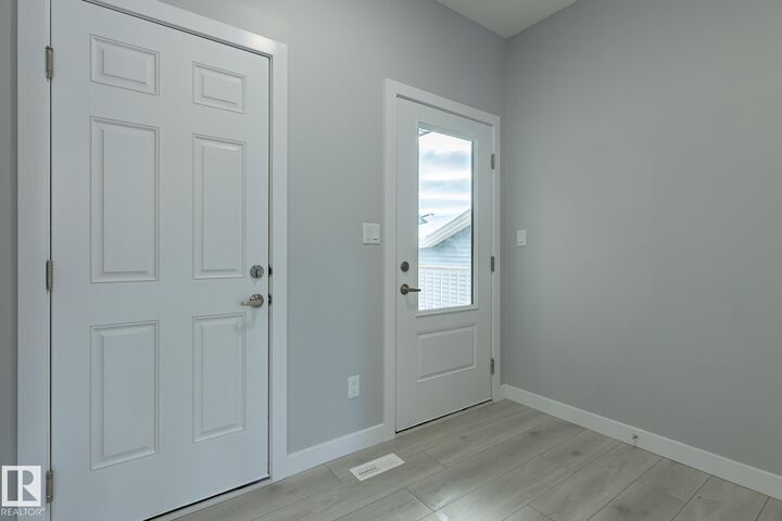 Property Photo:  10718 99 Street  AB T8R 2R8 