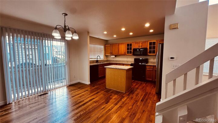 Property Photo:  1231 S Boston Court  CO 80247 
