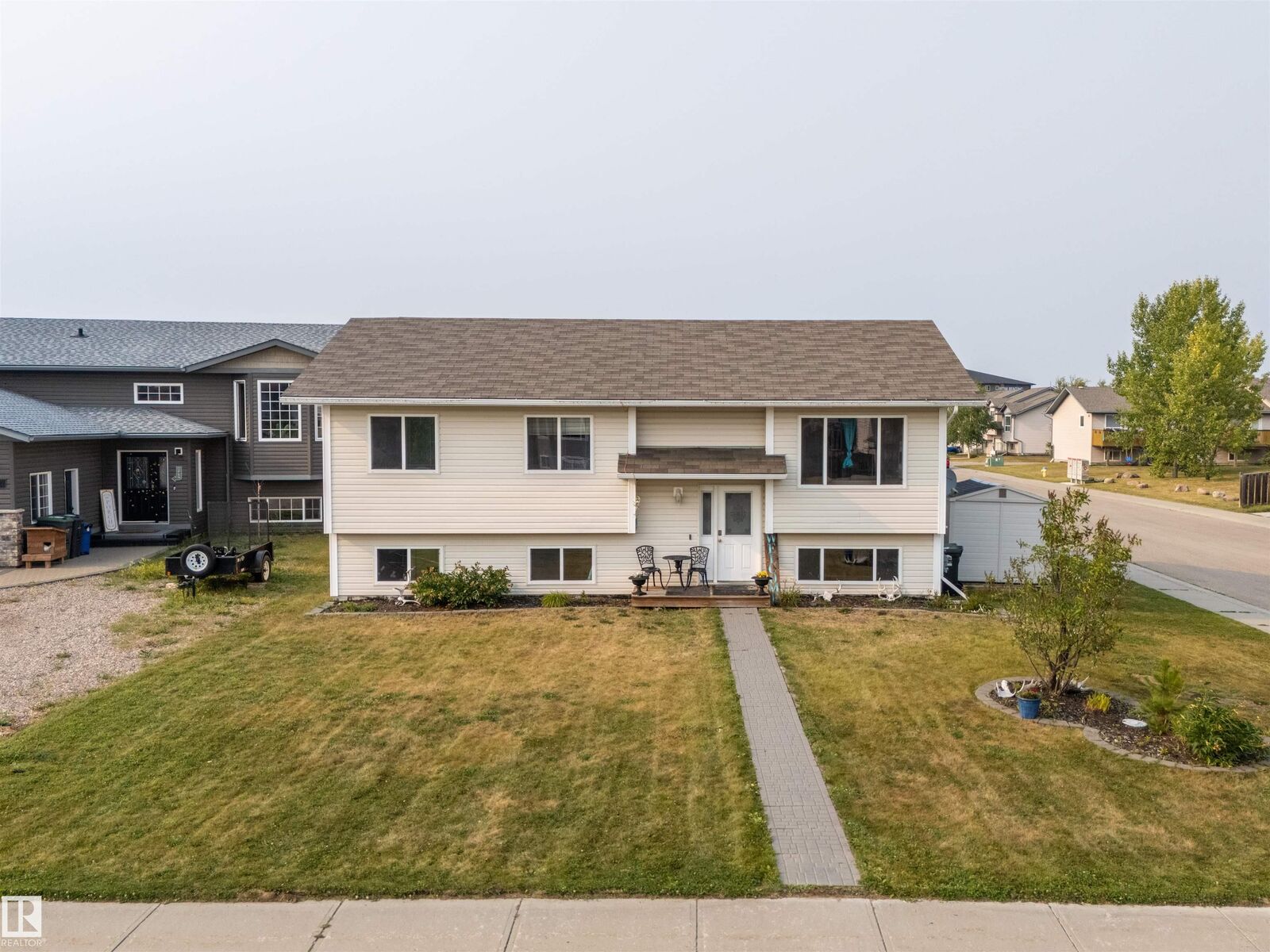Property Photo:  4802 64 Ave  AB T9M 0A9 