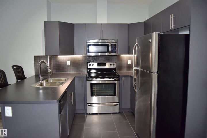Property Photo:  #109 10611 117 St Street NW  AB T5H 1K8 