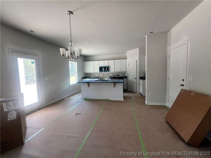 Property Photo:  122 Greenbay Street  NC 27546 