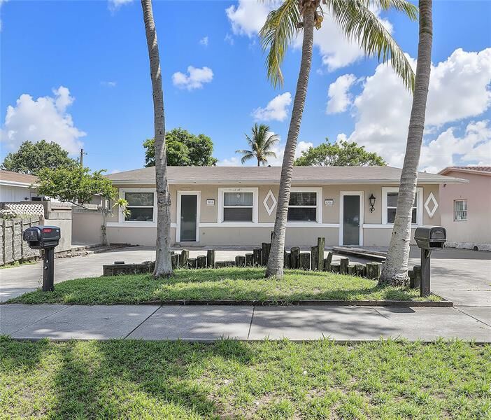 Property Photo: 112-116 NW 57th St FL 33309