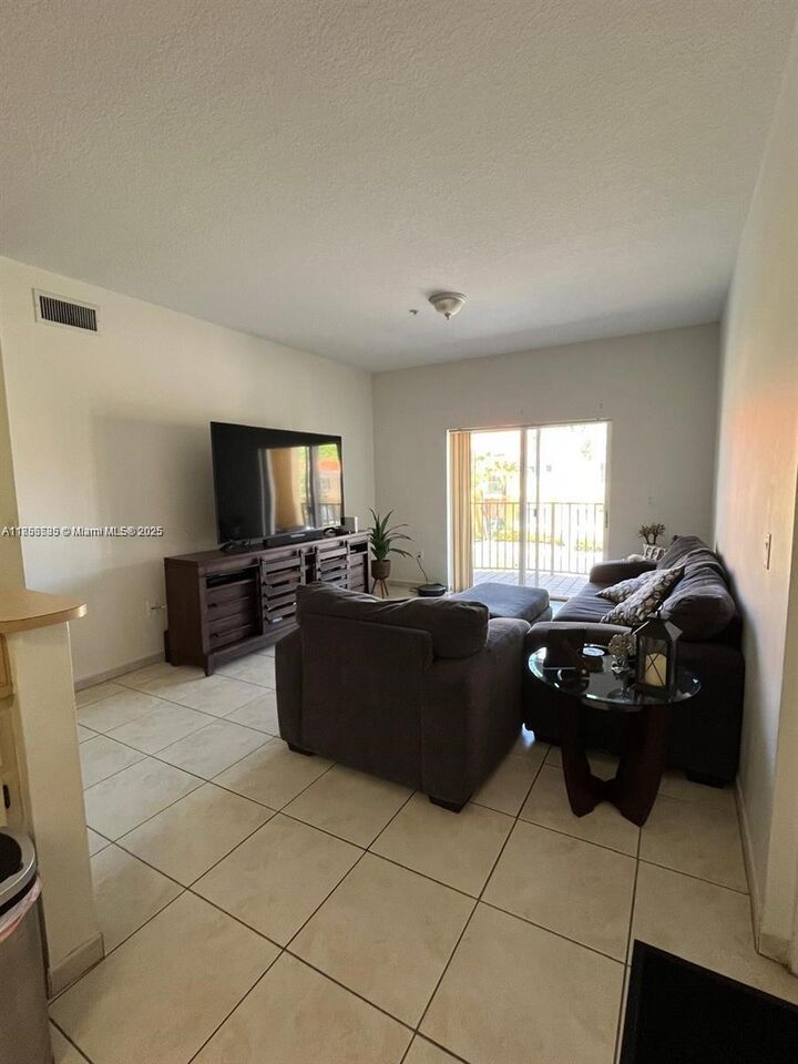 Property Photo: 7270 NW 114th Ave 203-9 FL 33178