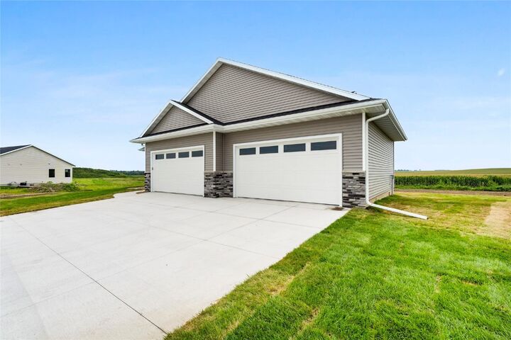 Property Photo:  305 Victory Lane  IA 52349 