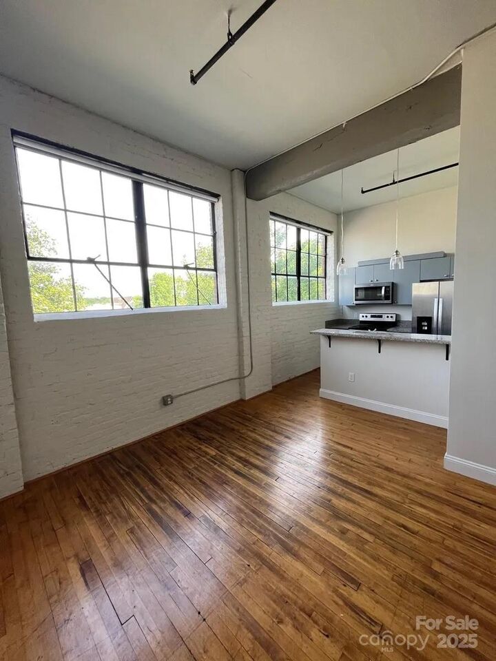 Property Photo: 109 N Hayne Street 214 NC 28112