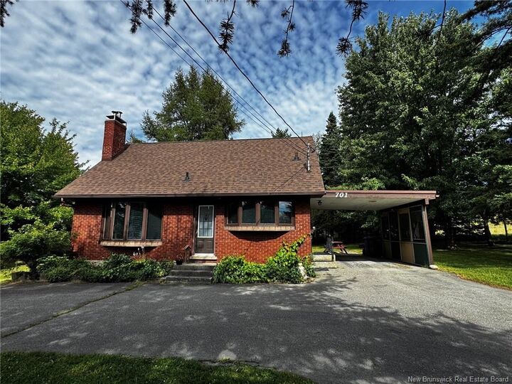 Property Photo: 701 Victoria Street NB E3V 3T3