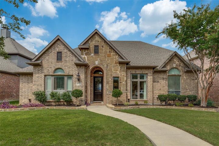 Property Photo: 416 Water Bridge Drive TX 75056