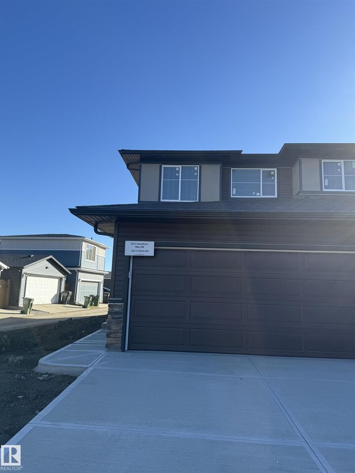 Property Photo:  5621 Hawthorn Way SW  AB T4H 1X9 