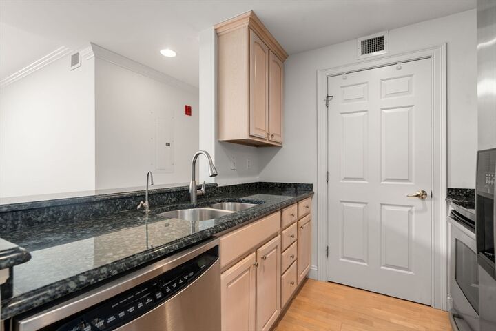 Property Photo:  121 Centre St Ph3  MA 02446 