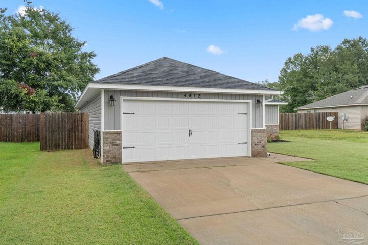 Property Photo:  4972 Wabash Pine Ct  FL 32571 