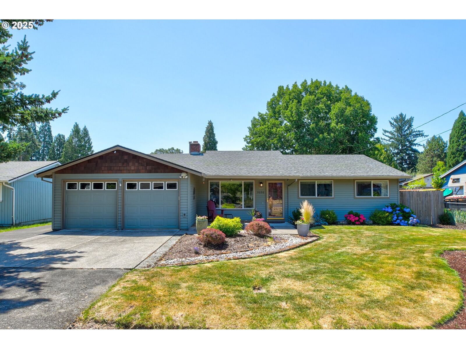 Property Photo:  9090 SW Coral St  OR 97223 