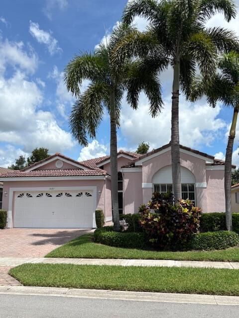 Property Photo:  7697 Lemonwood Street  FL 33437 