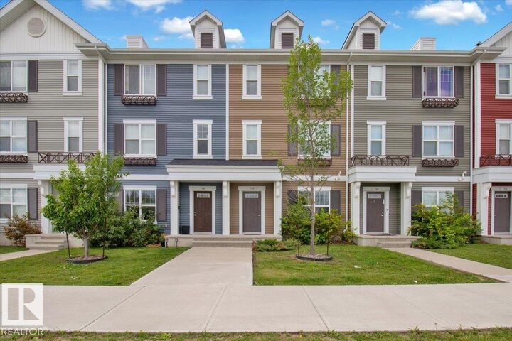 Property Photo: 8530 94 Street 104 AB T8L 0V8