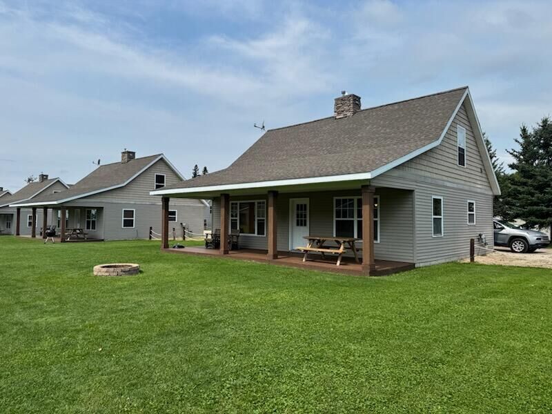 Property Photo:  Unit 23 Pine Bluff N10140 Co Rd 135  MI 49853 