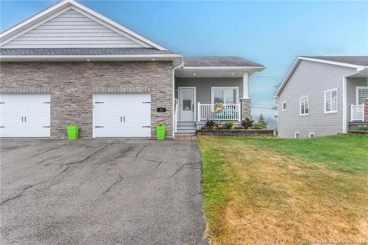 Photo de la propriété: 12 Hitachi Crescent NB E2M 0G4