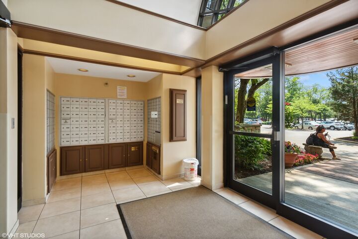 Property Photo:  509 Aurora Avenue 117  IL 60540 
