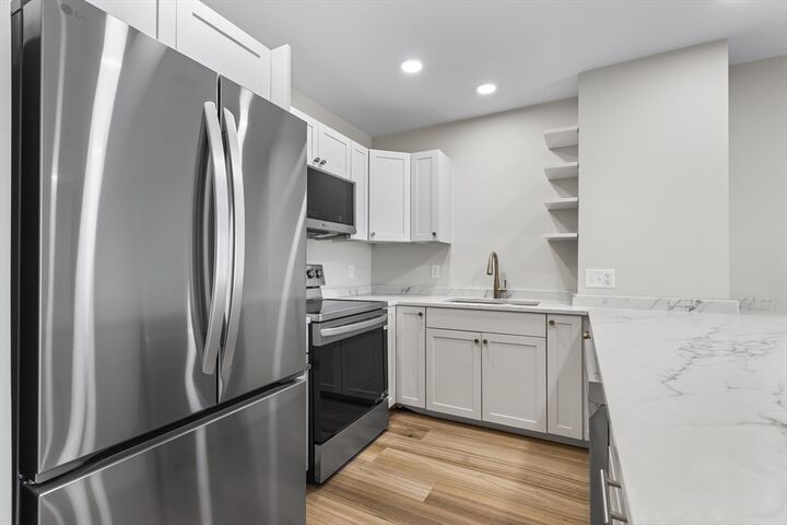 Property Photo: 64 Willard Street 406 MA 02169