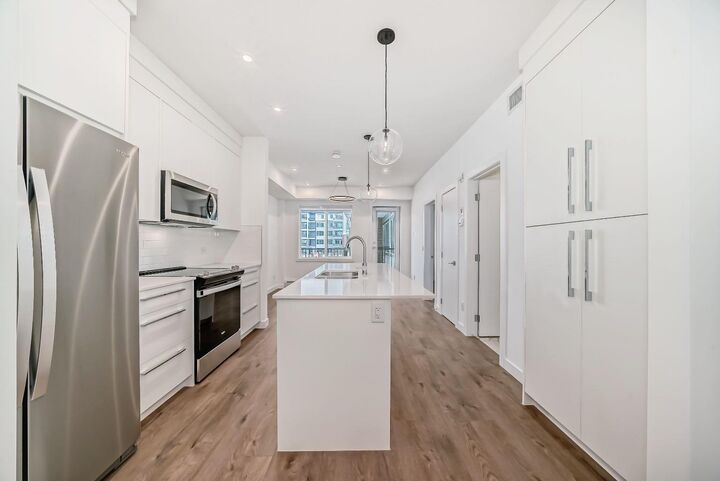 Property Photo: 111 Wolf Creek Drive SE 1201 AB T2X 5X2