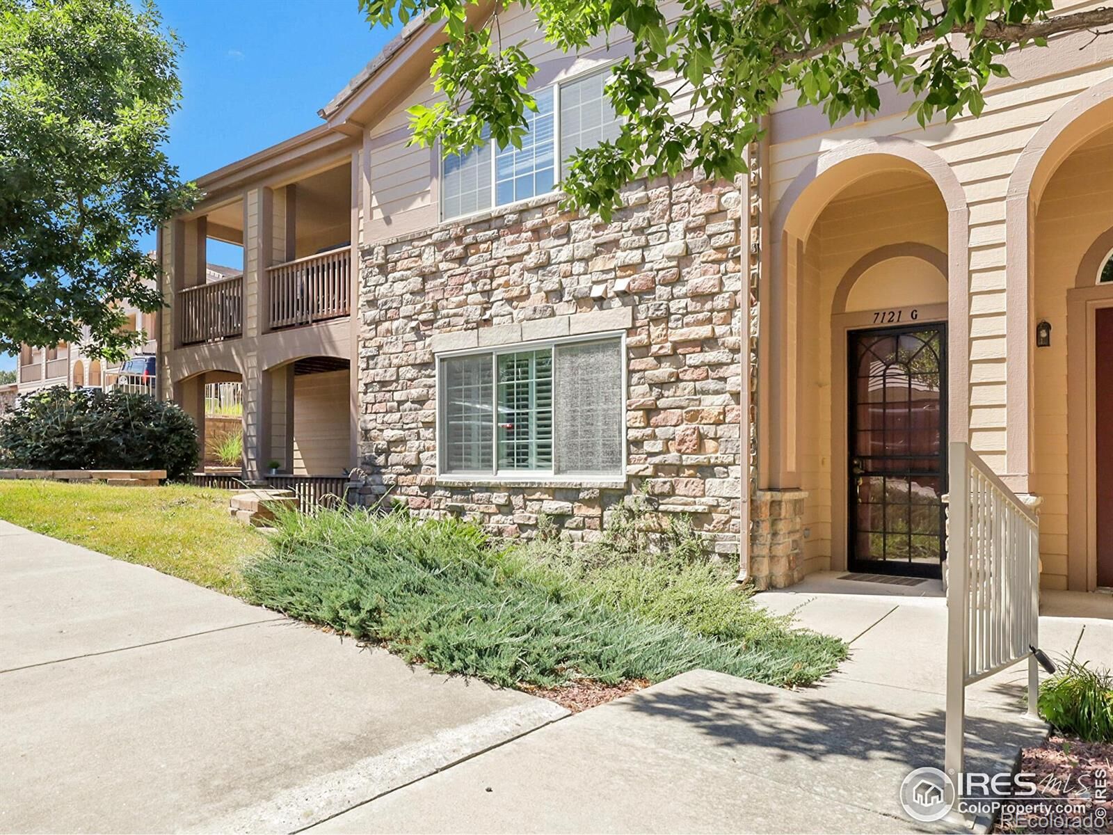 Property Photo:  7121 S Wenatchee Way G  CO 80016 
