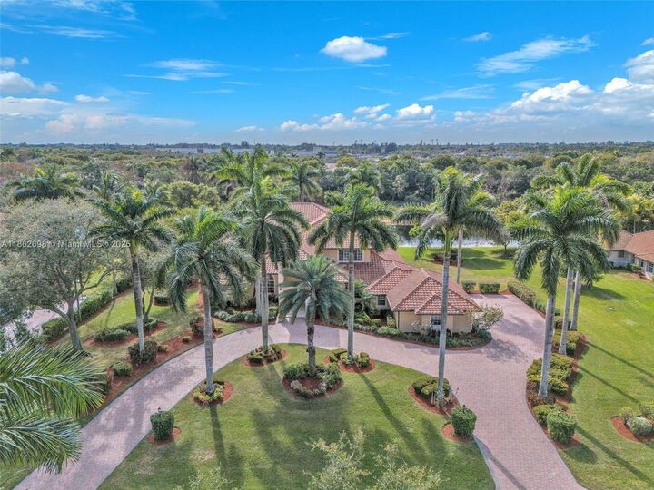 Property Photo:  3855 Windmill Lake Rd  FL 33332 