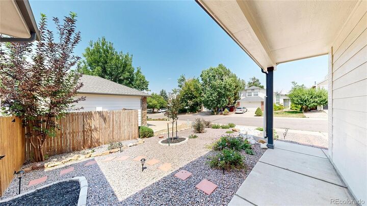 Property Photo: 3677 S Flanders Street CO 80013