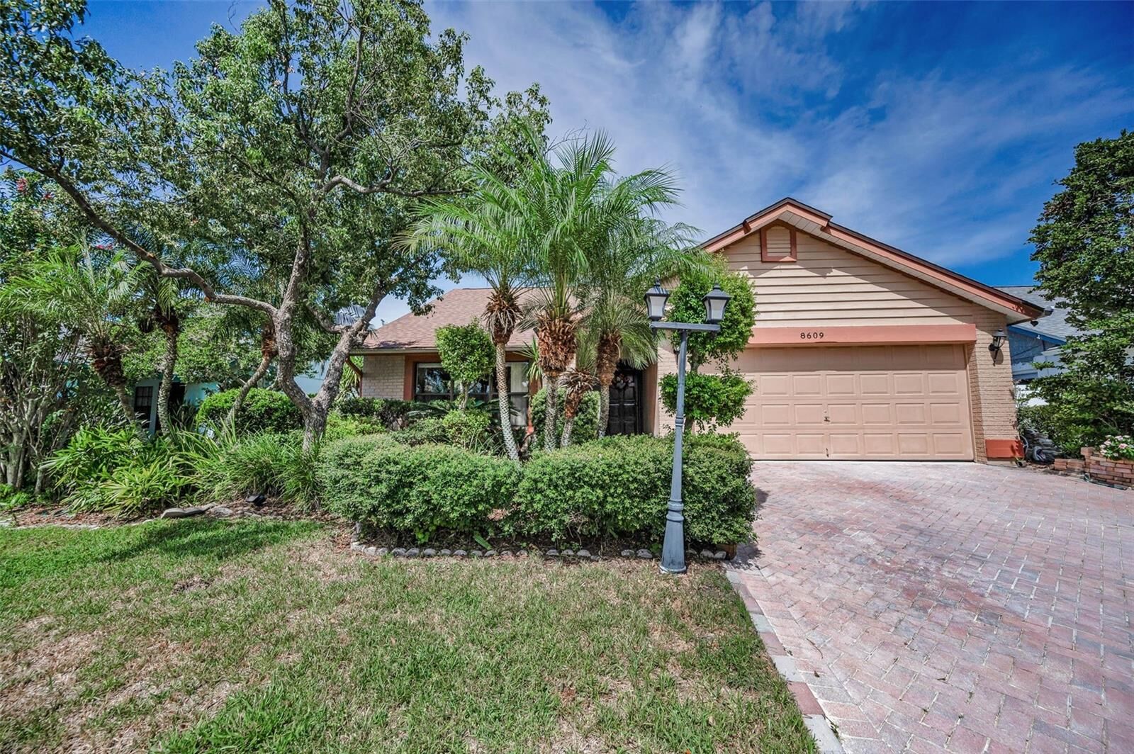 Property Photo: 8609 Thimbleberry Lane FL 33635