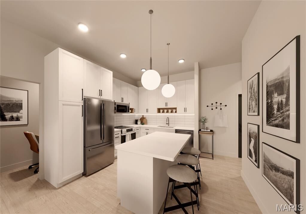 Property Photo: 1121 S Main Street 105 MO 63301