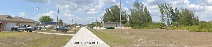 Property Photo:  2111 + 2113 NW 2nd Place  FL 33993 