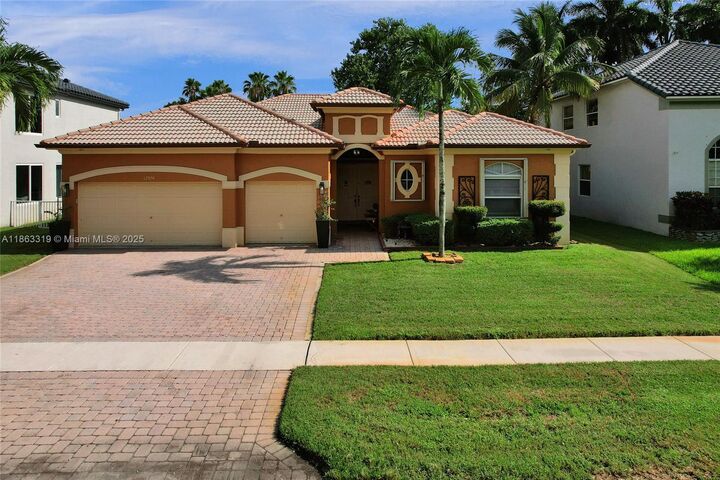 Property Photo: 12974 SW 24th St FL 33027