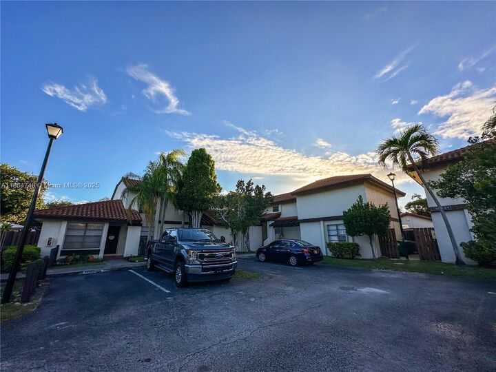 Property Photo:  11028 SW 132nd Pl 24-4  FL 33186 