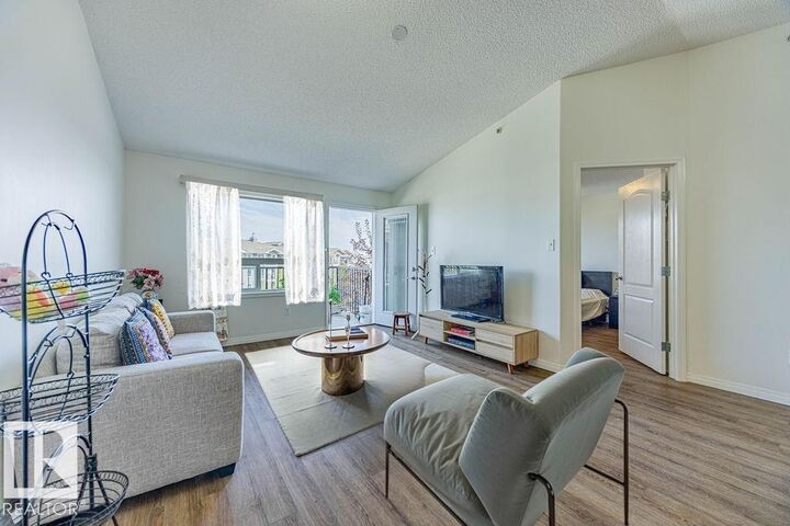 Property Photo: 9363 Simpson Drive NW 1401 AB T6R 0N2