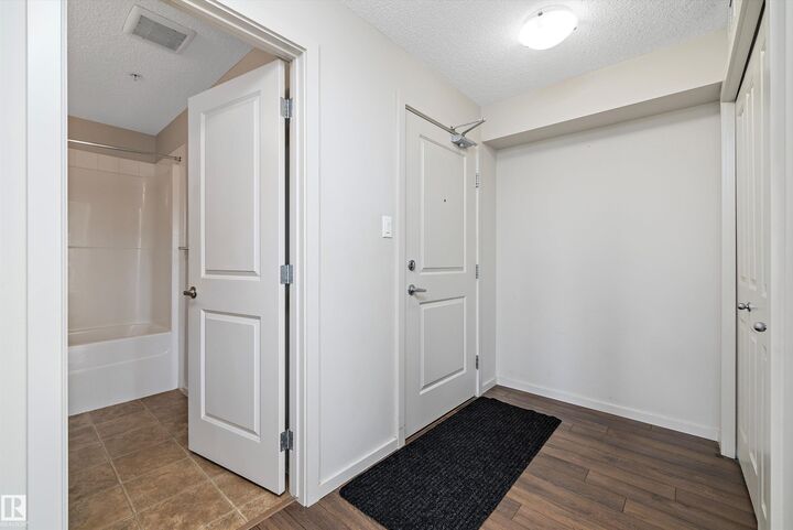 Property Photo: 142 Ebbers Boulevard NW 302 AB T5Y 3W2